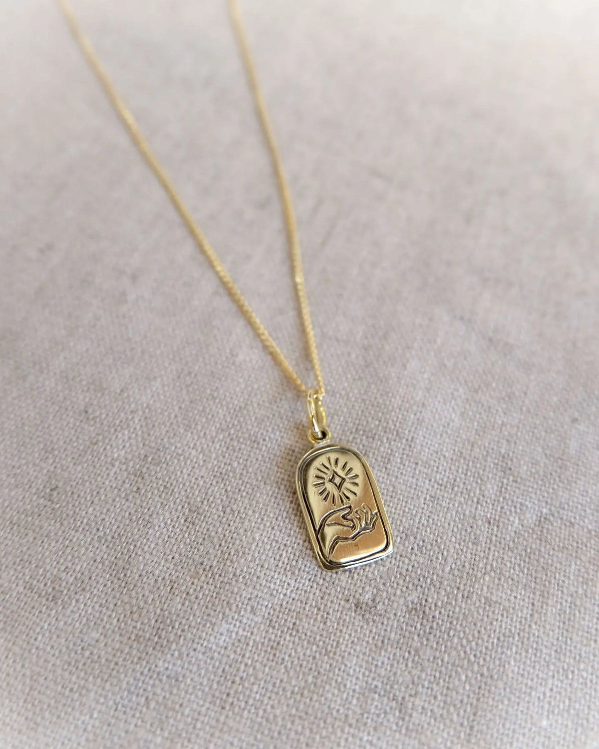 Hand of Light Charm in Brass Yin Jewelry for the Soul