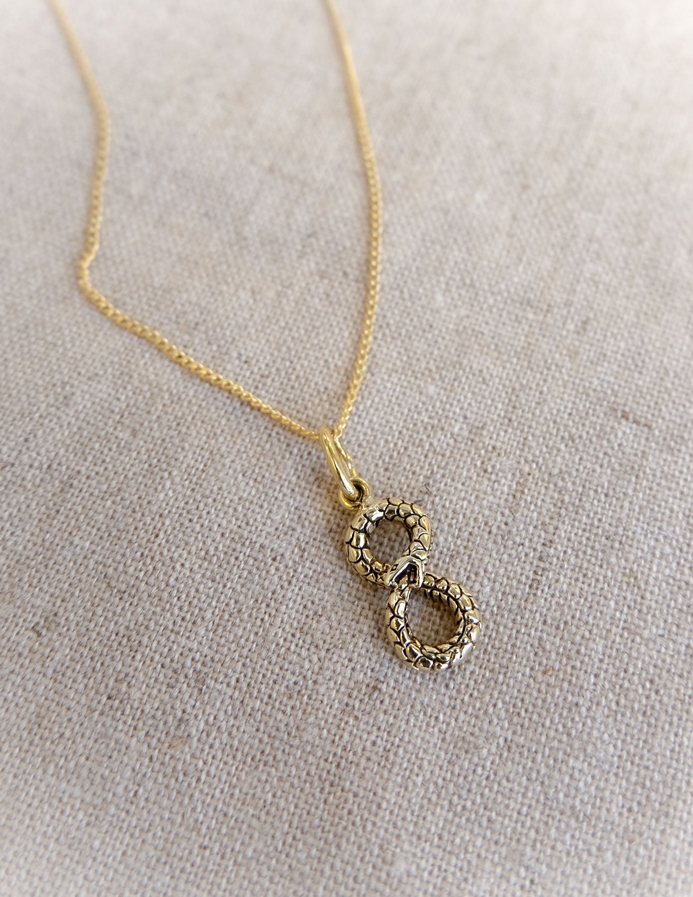 Ouroboros Snake Infinity Charm in Brass Yin Jewelry for the Soul