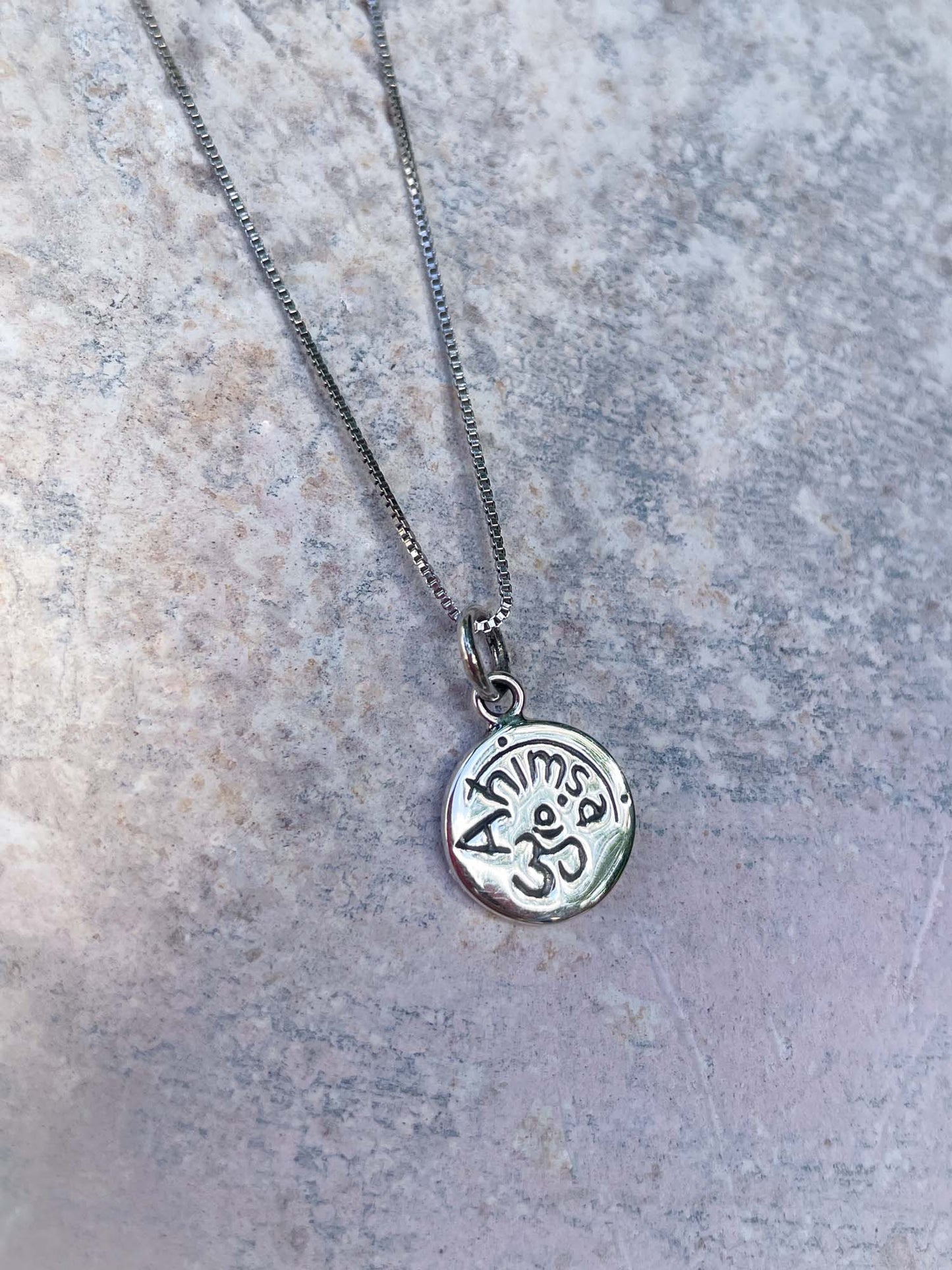 Ahimsa Charm in Silver
