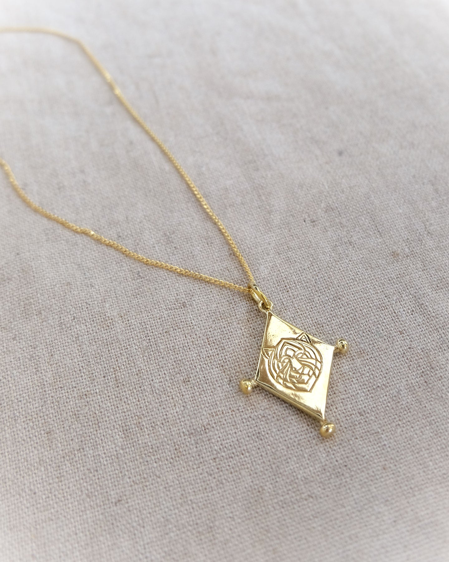 Lion Diamond Pendant in Brass